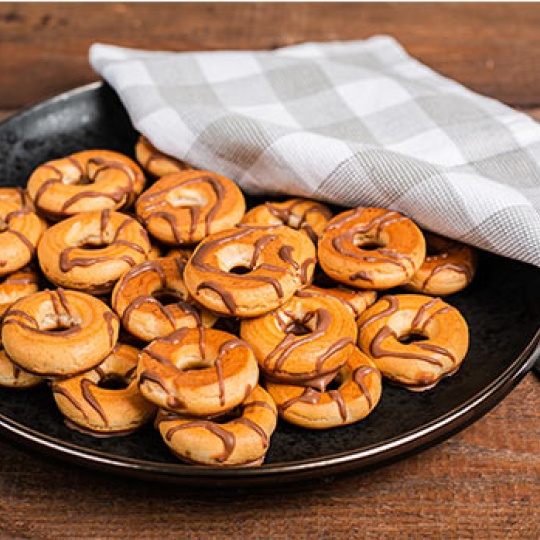 Акция Печенье сдоб. "Колечки хрустящие" в карамельной глаз. г. Москва ООО "КФ Баттерфляй" (1,4кг)